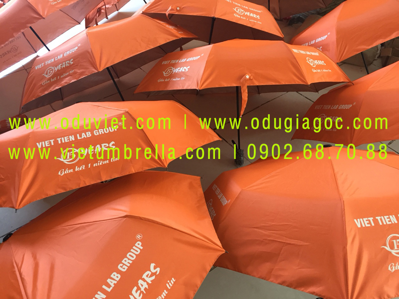 xưởng sản xuất ô dù cầm tay in logo quảng cáo